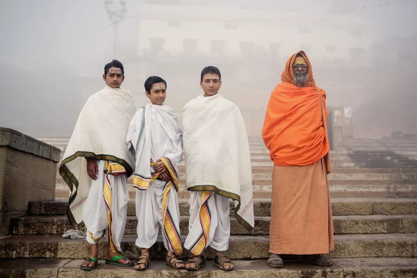 Sadhu Guru and young monks in Varanasi Stock Photo