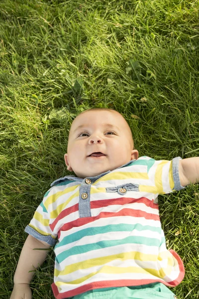 Baby on the grass — Stock Photo, Image