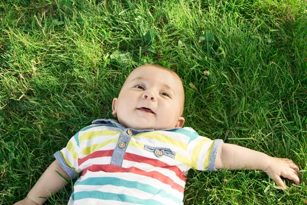 Baby on the grass — Stock Photo, Image