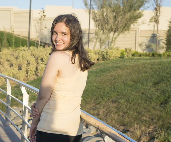 Young brunette girl in the Park — Stock Photo, Image