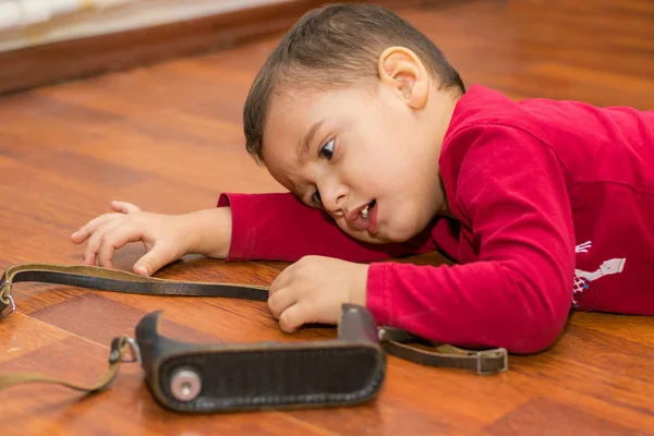 Boy  lying on the floor — Stock Photo, Image