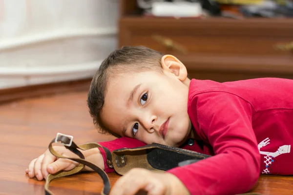 Boy  lying on the floor — Stock Photo, Image