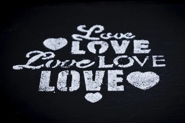 Love lettering on black board — Stock Photo, Image