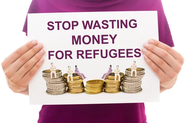 Хватит тратить деньги на беженцев. — стоковое фото