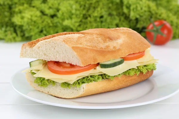 Sub sandwich baguette on plate with cheese for breakfast — Stock Photo, Image