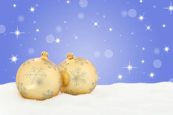 Weihnachten goldene Kugeln Hintergrunddekoration mit Schneestern — Stockfoto