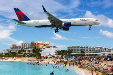 Sint Maarten, Netherlands Antilles - September 17, 2016 Delta Air Lines Boeing 757-200 airplane at Sint Maarten Airport (SXM) in the Caribbean. clipart