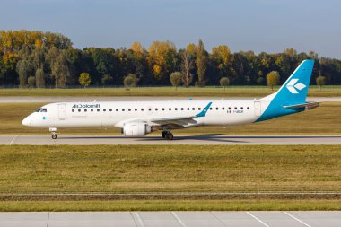 Munich, Germany - October 21, 2020 Air Dolomiti Embraer ERJ 195 airplane at Munich Airport (MUC) in Germany.