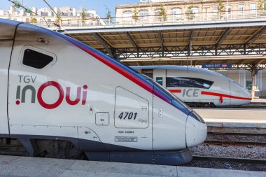 Paris, France - July 23, 2019 French TGV and German ICE high-speed train Deutsche Bahn DB Paris Est railway station in France. clipart