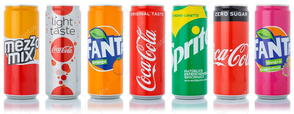 Stuttgart, Germany - January 11, 2021 Coca Cola Coca-Cola Fanta Sprite products lemonade soft drinks in cans isolated on a white background in Stuttgart in Germany.