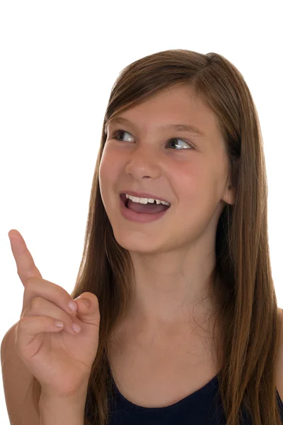 그녀의 손가락으로 가리키는 웃는 소녀 — 스톡 사진