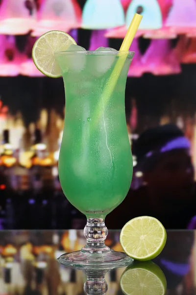 Green fruit cocktail in a bar or club — Stock Photo, Image
