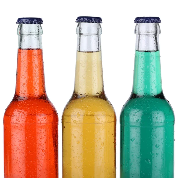 Refrescos coloridos o limonada en botellas aisladas — Foto de Stock