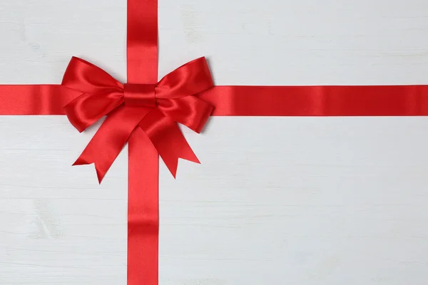 Gift bow for gifts on a wooden background — 스톡 사진