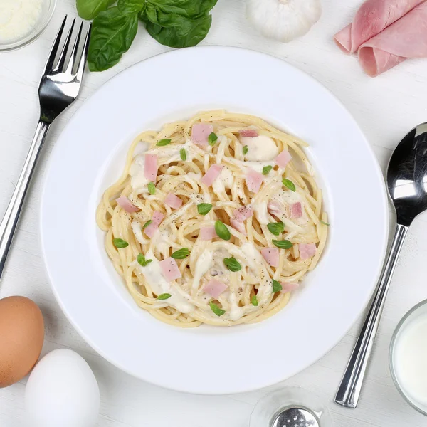 Spaghetti Carbonara noodles pasta meal from above Stock Photo by