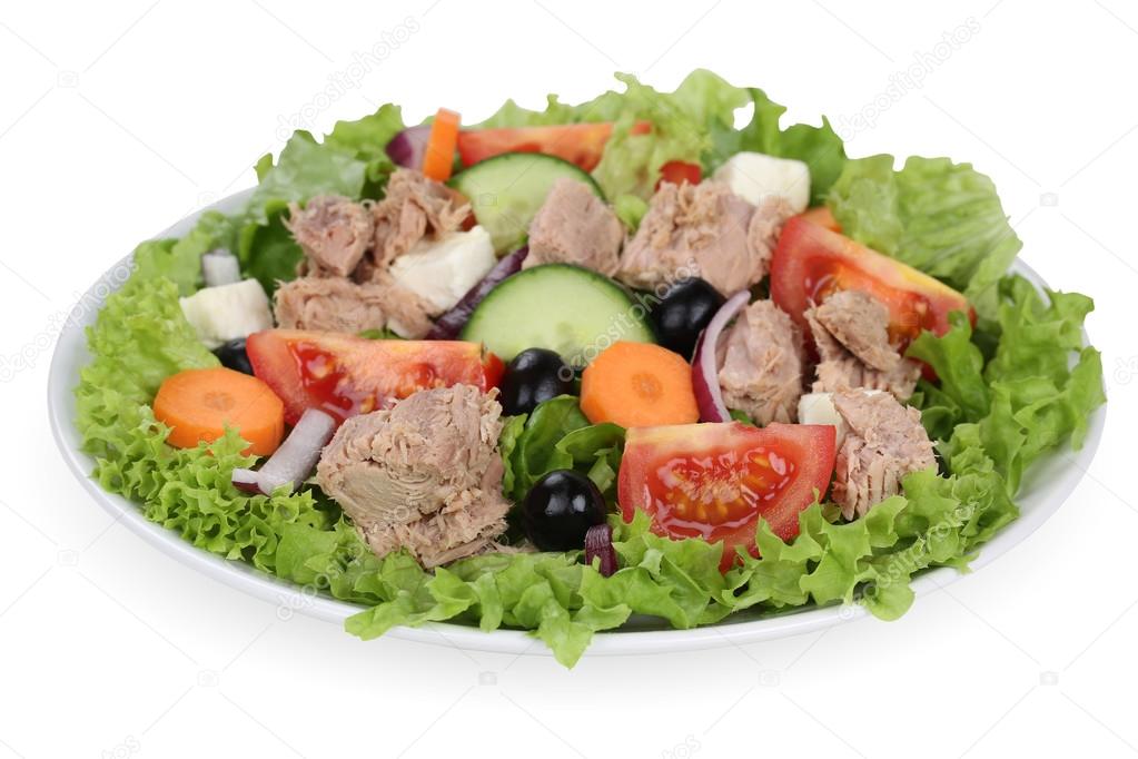 Tuna salad with tomatoes, carrots and olives in bowl