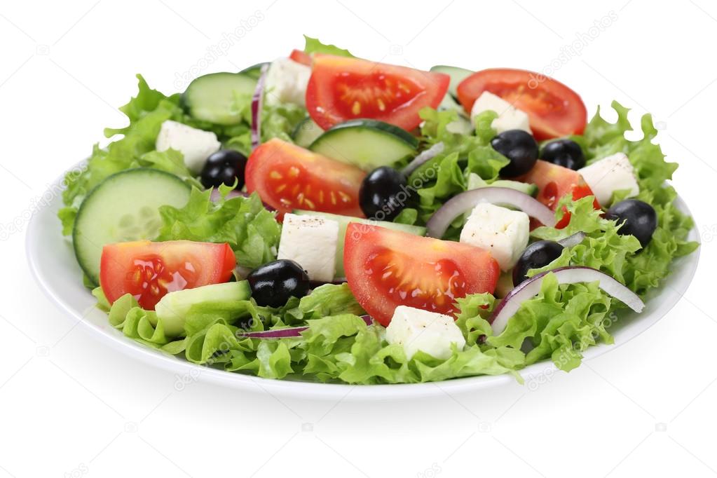 Greek salad with tomatoes, Feta cheese and olives in bowl