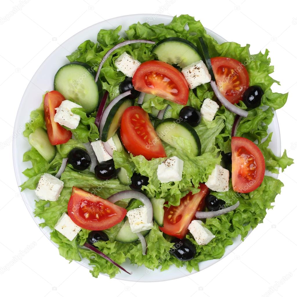 Greek salad with tomatoes, Feta cheese and olives in bowl from a