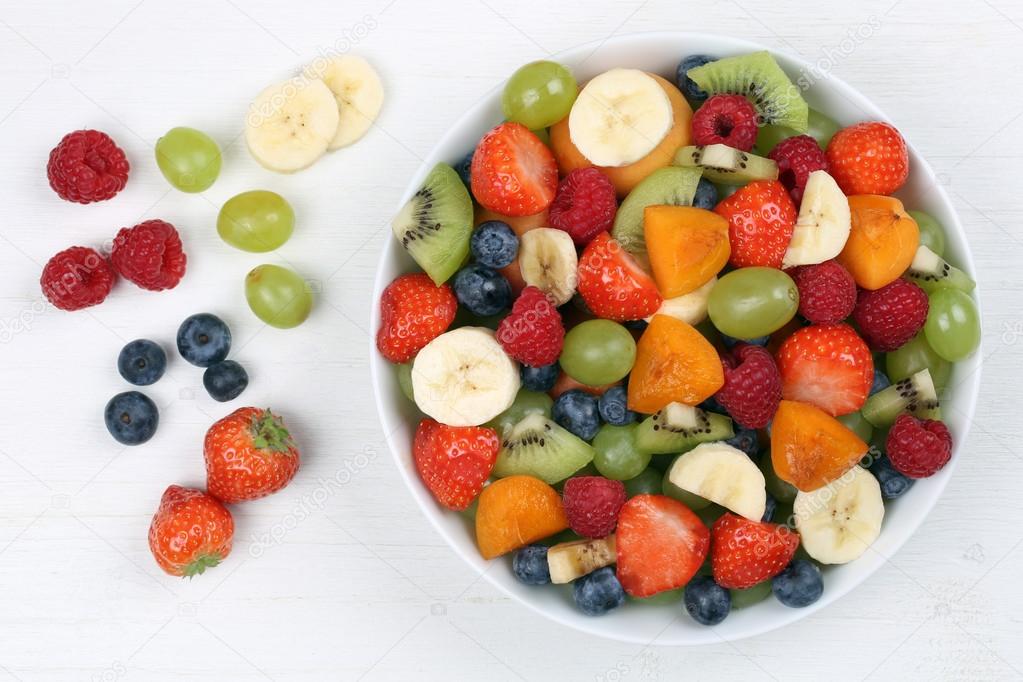 Fruit salad with fruits like strawberries, blueberries and apric
