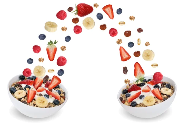 Flying fruit muesli for breakfast in bowl with fruits like banan — Stock Photo, Image