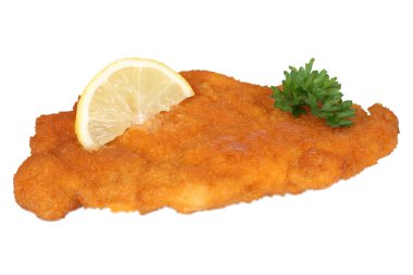 Şnitzel chop göğsü izole maydanoz ve limon ile