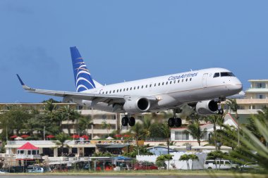 Copa Airlines Embraer ERJ190 airplane landing St. Maarten airpor clipart