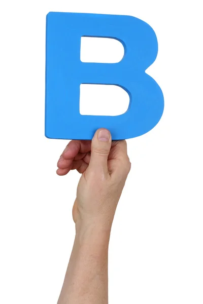 Hand holding letter B from alphabet — Stock Photo, Image