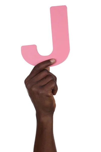 Hand holding letter J from alphabet — Stock Photo, Image