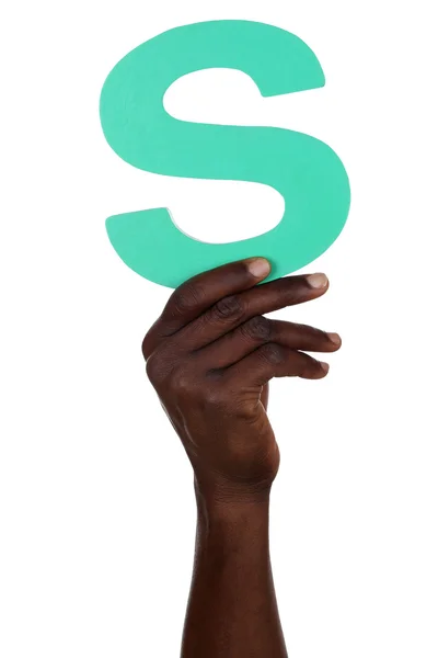Mão segurando letra S do alfabeto — Fotografia de Stock