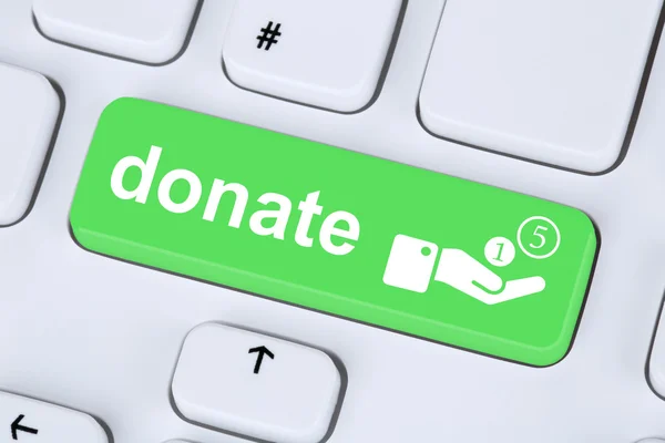 Donate money donation symbol on computer keyboard — Stock Photo, Image