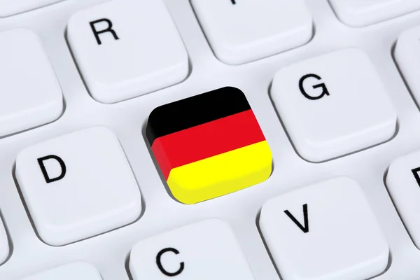 Alemania bandera internet en el teclado del ordenador — Foto de Stock