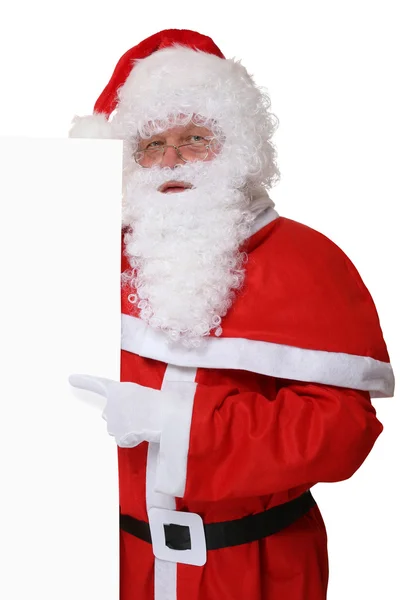 Santa Claus pointing on Christmas at empty banner with copyspace — Stock Photo, Image