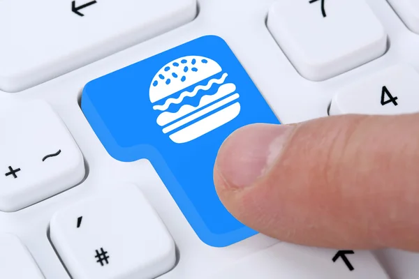 Ordering hamburger cheeseburger online fast food order delivery — ストック写真