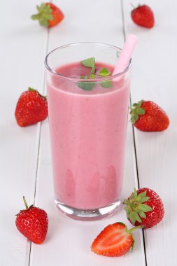 Strawberry smoothie fruit juice milkshake with strawberries frui