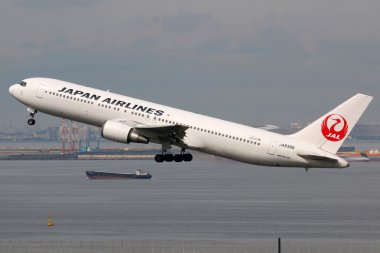 Japan Airlines Boeing 767-300 airplane Tokyo Haneda airport