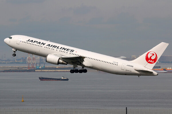 Japan Airlines Boeing 767-300 airplane Tokyo Haneda airport