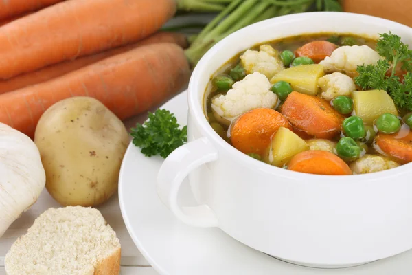 Vegetable soup meal closeup with vegetables in bowl — Stock Photo, Image