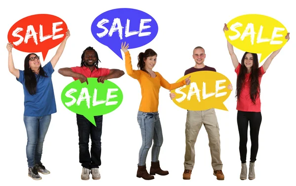 Sale shopping group of happy young people holding speech bubbles — ストック写真