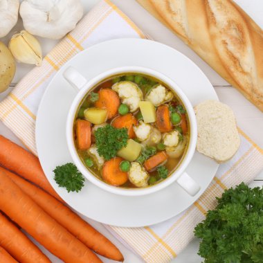 Vegetable soup meal with vegetables in bowl from above healthy e