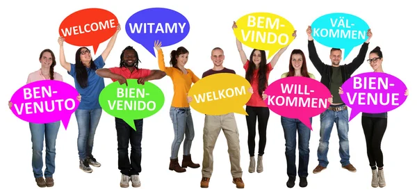 Refugees welcome in different languages group of young multi eth — Stock Photo, Image