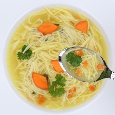 Healthy eating noodle soup in bowl with noodles and spoon