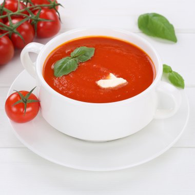 Healthy eating tomato soup with tomatoes in bowl