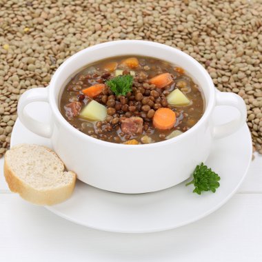 Healthy eating lentil soup stew with fresh lentils in bowl