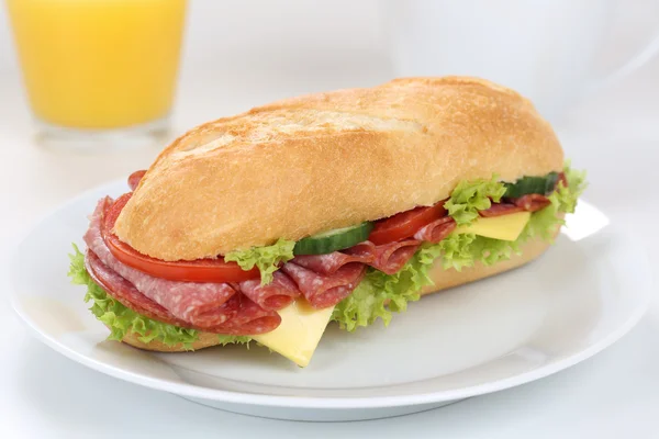 Sub deli sandwich baguette for breakfast with salami ham and ora — Stock Photo, Image
