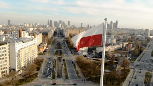 Top Down view of vehicles driving on contemporary roundabout intersection in sunny day in city . WARSAW, POLAND, 15 MARCH 2020 — Stock Video