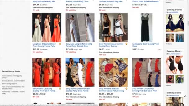 Computer user choose evening dress on eBay website — Stock Video