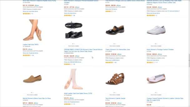 Amzon webpage user looking for shoes — Stock Video