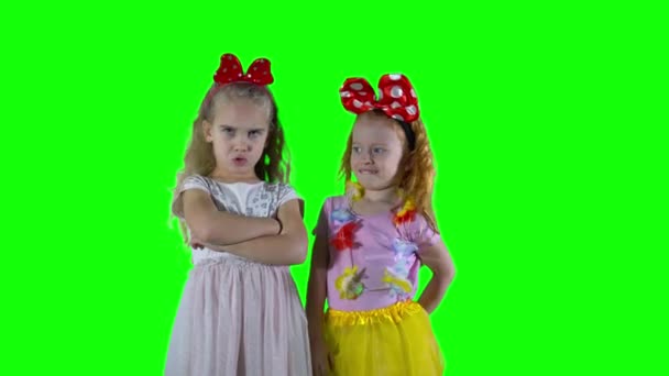 Naughty kids girls showing negative emotions. Chroma key green background — Αρχείο Βίντεο