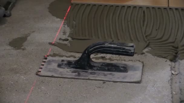 Worker Man Lay Ceramic Floor Tiles In Kitchen Zoom Out Stock Worker Man Lay Ceramic Floor Tiles In Kitchen Zoom Out Stock