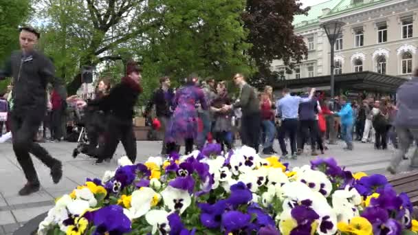 Young active people in pairs dance lindy hop in city square. 4K — Stock Video